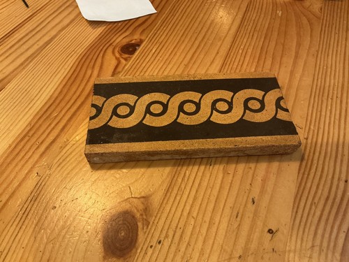 Encaustic border floor tile.