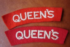 Queen's Regiment embroidered cloth shoulder titles.