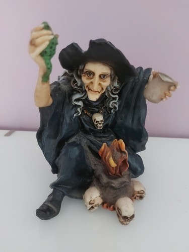 Witch and cauldron - and,