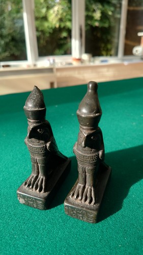 Decorative statues depicting