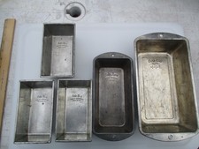 LOT OF 5 VINTAGE TIN BAKE-KING