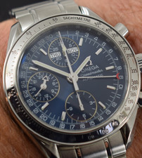 omega speedmaster triple date 3523.80.00 box  papers    1 yr gte 2006y