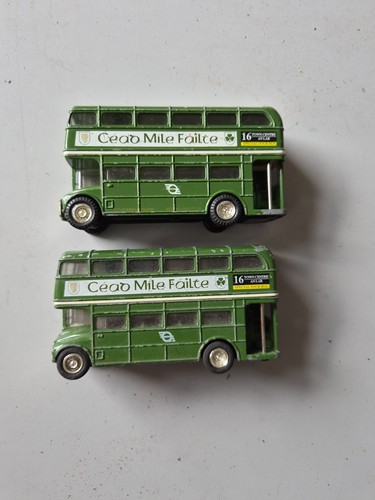Two diecast vintage buses