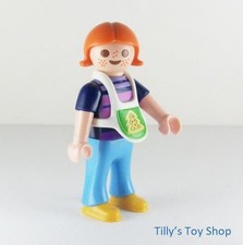 Playmobil      Xmas - Little Girl figure in fixed Christmas Apron - Pre-owned