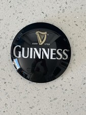 A New Guinness Round Frog eye T. Bar Badge