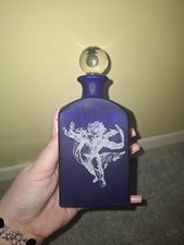 Blue Glass Bottle Cherub