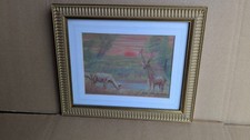 Framed artwork in pastels