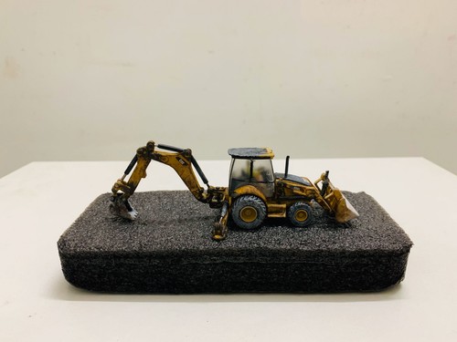 Cat 450e backhoe loader muddy - loader,