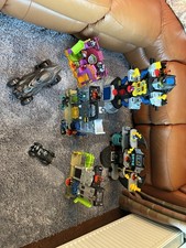 Imaginext DC Batman Bat cave and jokers fun house With vehicles and figures