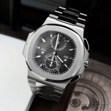 Patek philippe nautilus travel - philippe,