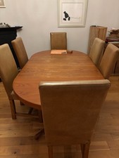 Extendable circular dining room table - seat upto 12