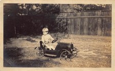 Antique Boy Driving Metal