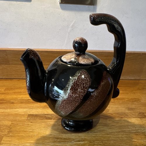 Black brown glossy ceramic - &,