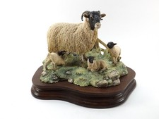 A BORDER FINE ARTS FIGURINE CALLED " SPRING LAMBING " REF 1067/1