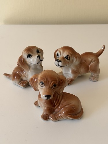Vintage puppy figurines - ,