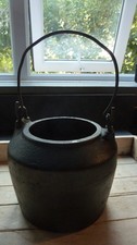 Antique  small cast iron cauldron with handle.