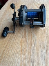 DAIWA MAG FORCE PMF57H MULTIPLIER good used condition with some line.