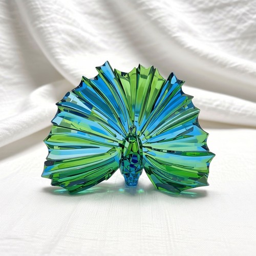 Swarovski arya peacock 2015 - swarovski,