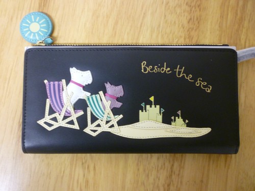 Radley large purse beside the - radley,