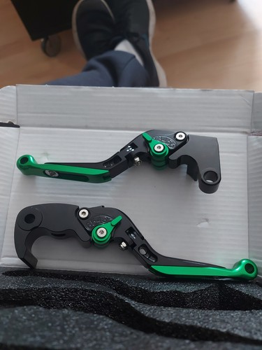 Brake and clutch - and, levers