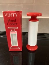 Home brew wine Hand Corking