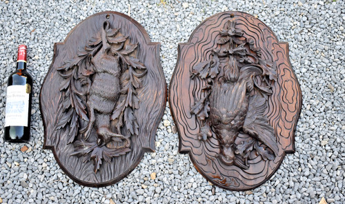 Pair antique black forest wood - pair,