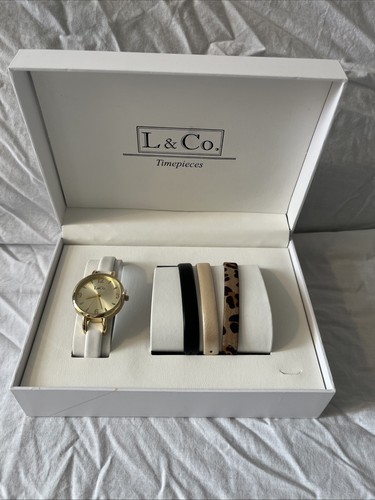 Watch with interchangeable - with,