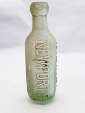 ANTIQUE EMBOSSED GREEN GLASS