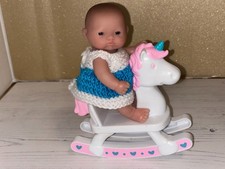 5 inch Itty Bitty Berenguer Doll (preloved) on Rocking Unicorn with New Dress