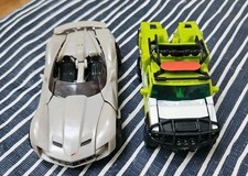 2 X TRANSFORMERS PLASTIC  CAR TOYS