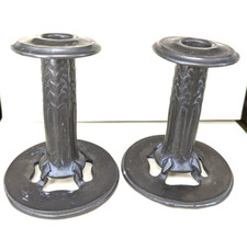 Pair of candlesticks designed