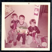 Vintage Christmas Photo BOYS OPEN CHRISTMAS STOCKINGS TOYS 1950's