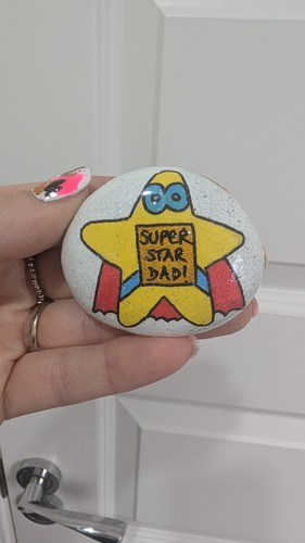 Hand painted pebble super - hand,