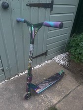 Team Dogz oil slick Push Scooter.  Shows signs of use, however works perfect.