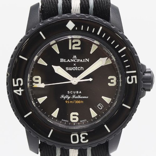 Boxed working blancpain swatch - boxed,