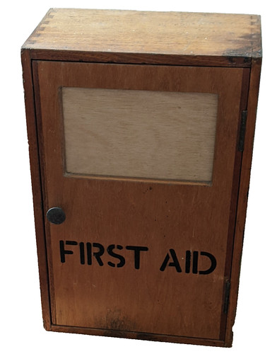 Vintage wooden first aid - first,