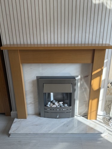 Golden oak fireplace surround
