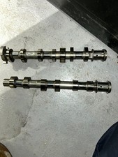 Inlet and exhaust camshaft for - and,