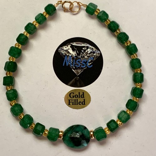 Gold emerald jade and - emerald,