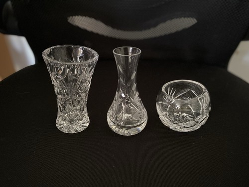 Three small crystal - , vases.