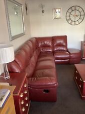 Red leather corner sofa with