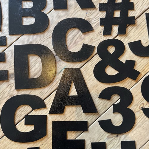 Black metal letters signs - letters, a-z