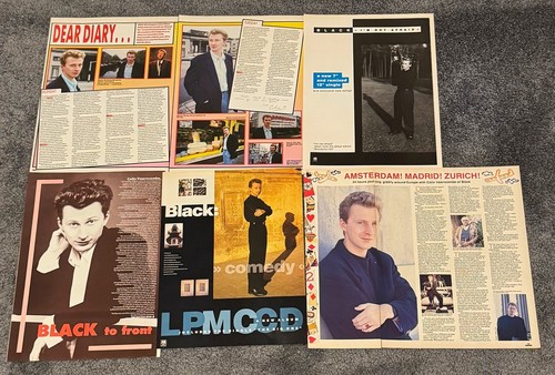 Black magazine cuttings - black, (colin