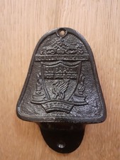 A Liverpool Fc Black Cast Iron Bottle Opener.