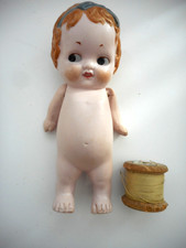 Antique doll  all bisque porcelain boy approx 5 inches high. 1920s