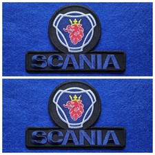 A Pair Of Motor Car Racing