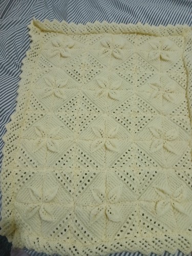 Hand knitted baby - hand,