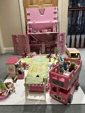 Rosebud Wooden dolls house And Village shops. Full furniture and figures inc. 