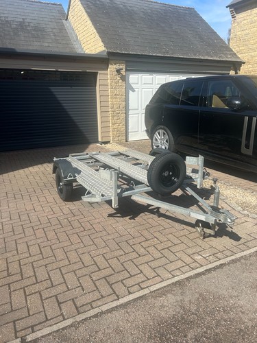 Three motorbike trailer - three,