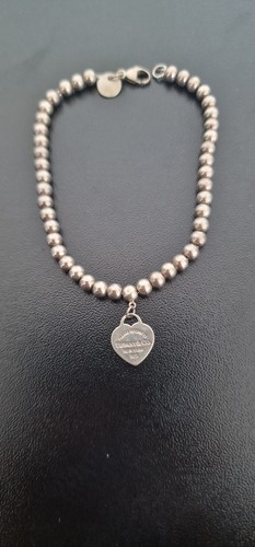 Return tiffany co - to,
